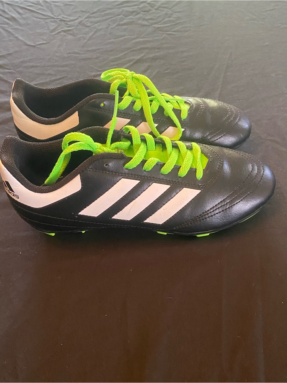 adidas Black Soccer Cleats with White Stripes and Neon Green Laces